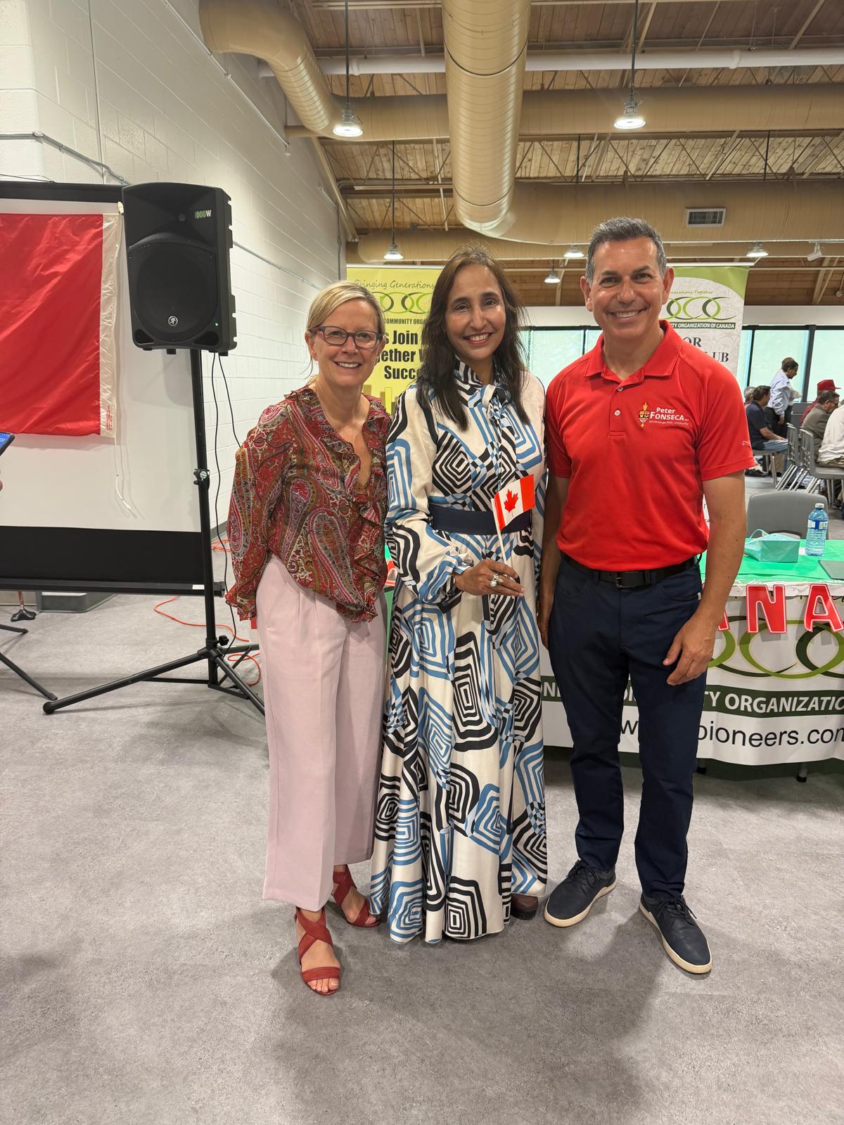 Naila in conversation with residents on Canada Day