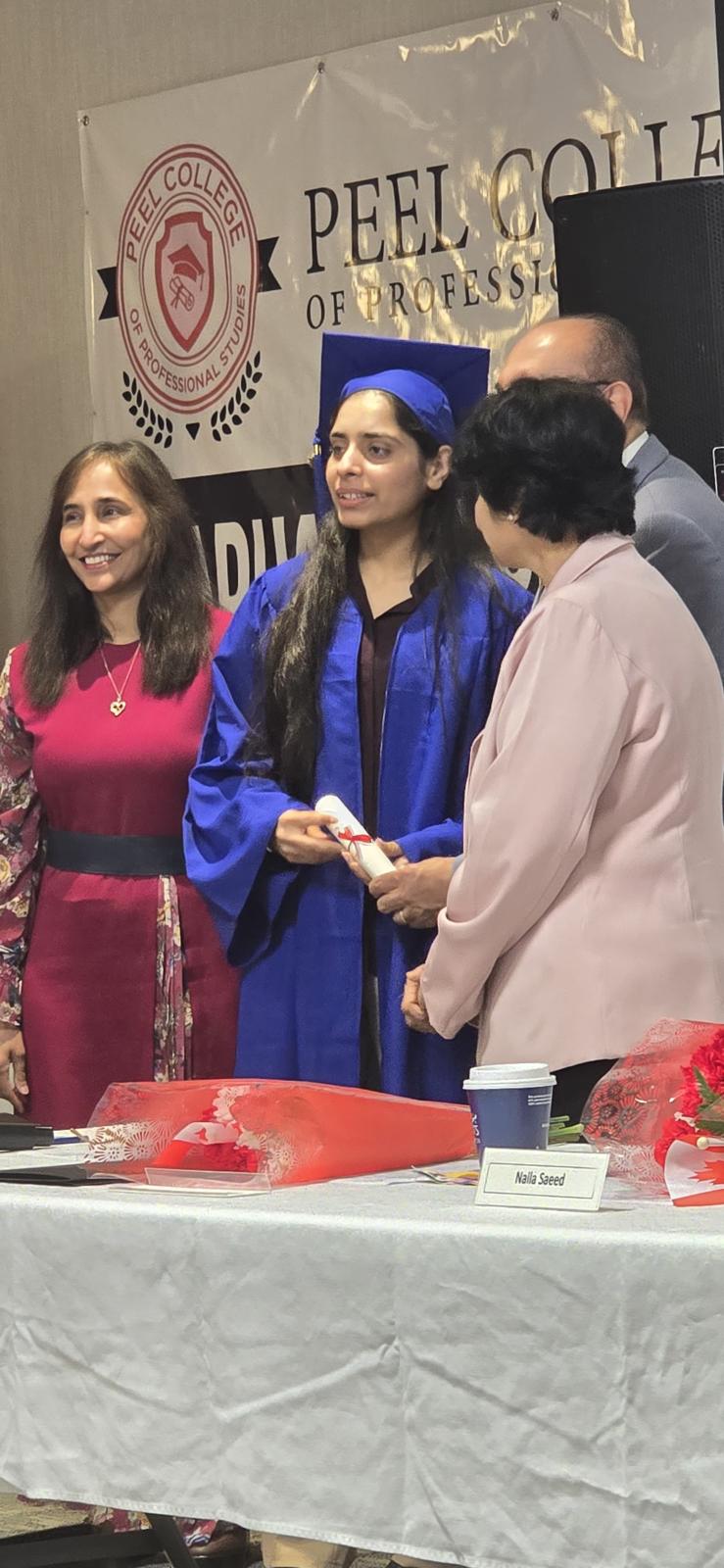 Naila with community members at a Canada Day gathering