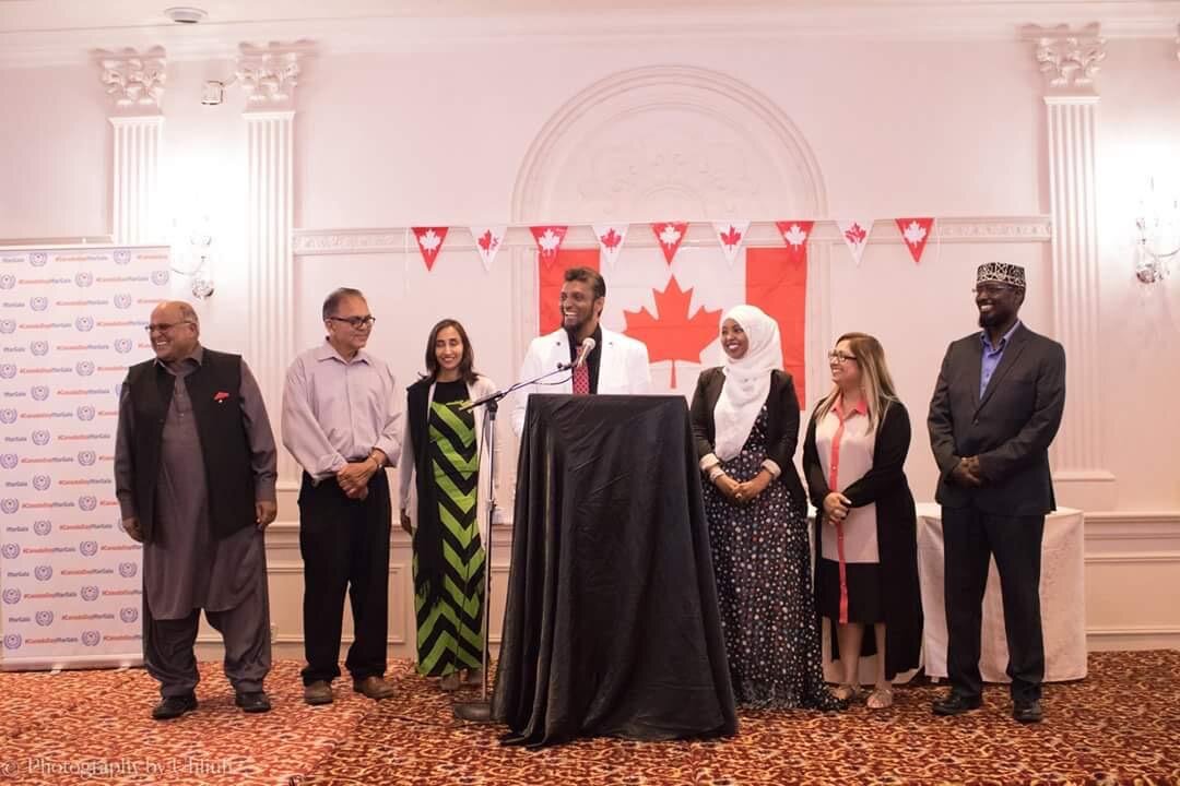 Community celebration with remarks at a podium