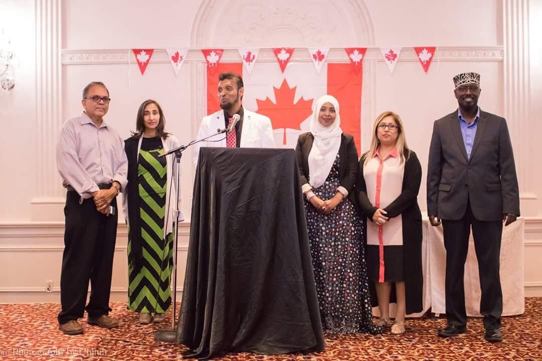 Naila speaking at a community event