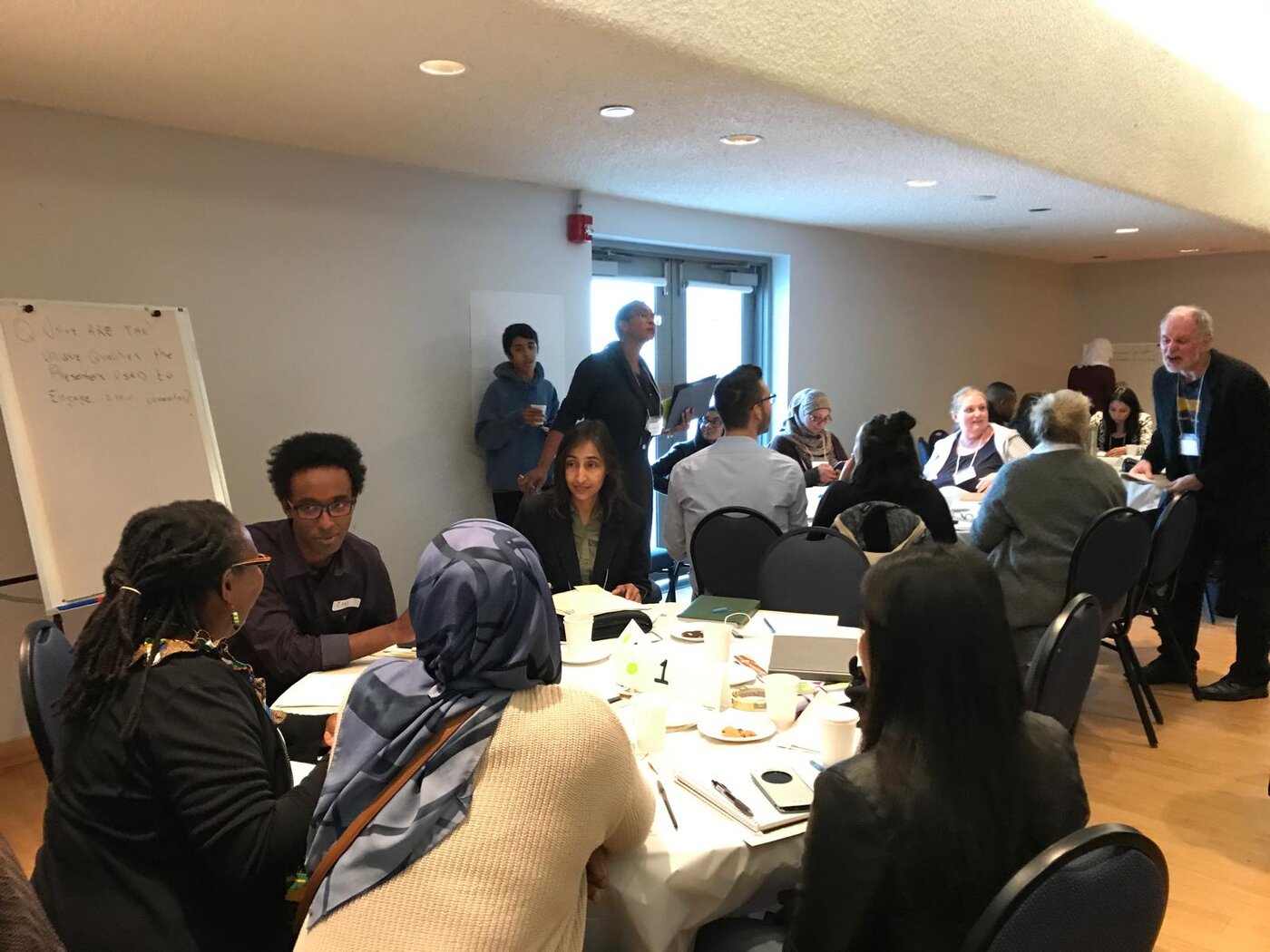 Naila at a community workshop and roundtable