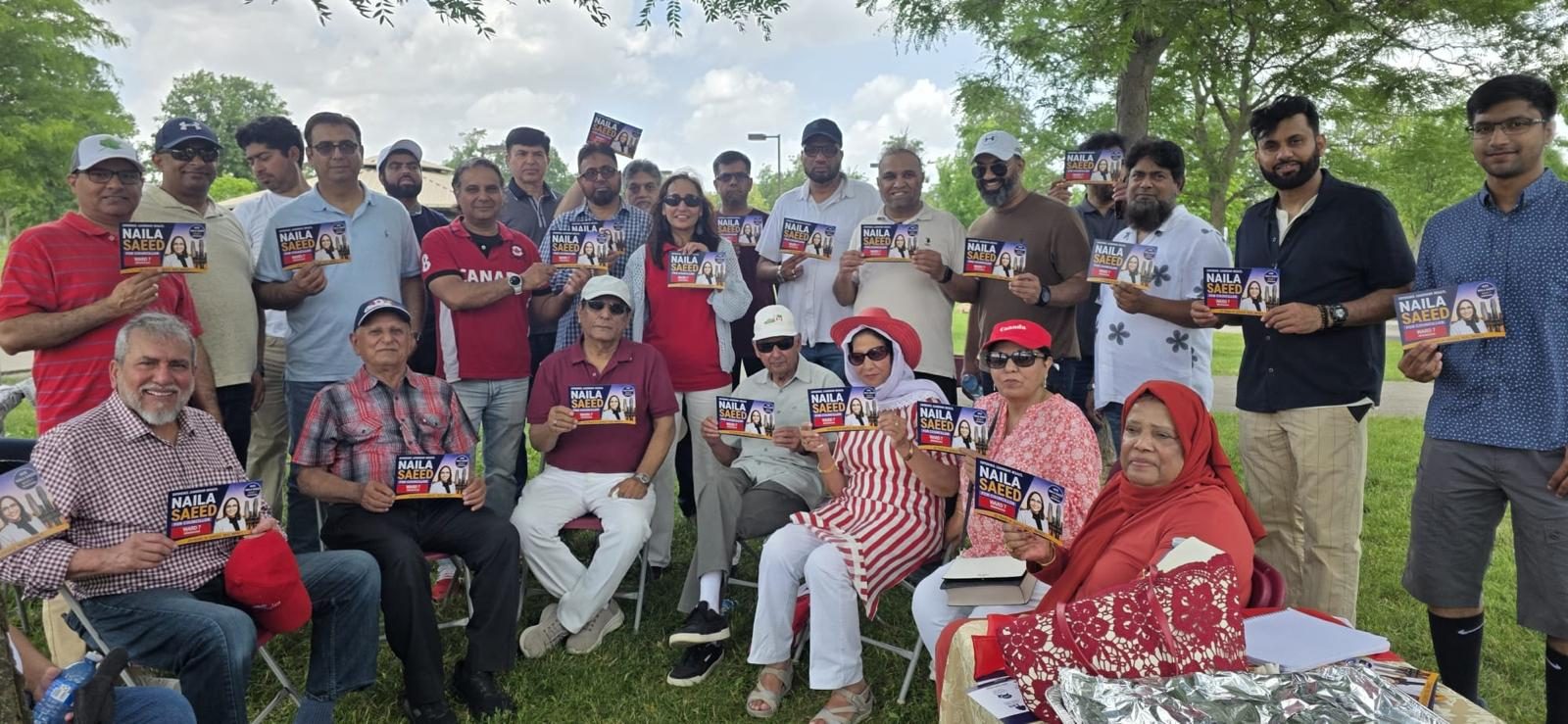 Naila Saeed with a large group of Ward 7 residents celebrating Canada Day in the park
