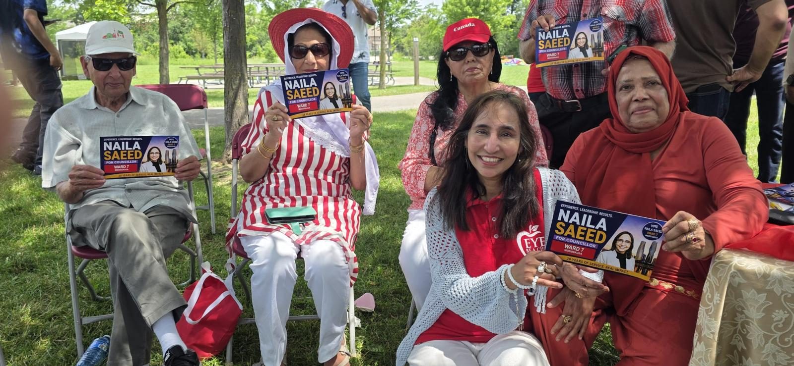 Community supporters in Canada Day red and white