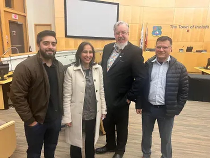 Naila with civic leaders