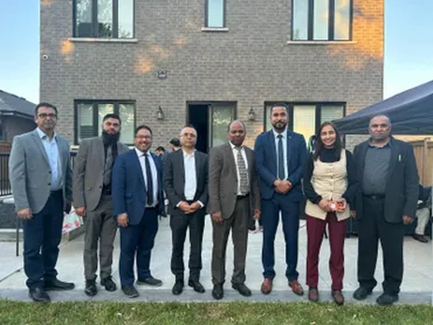 Community members outside a local building