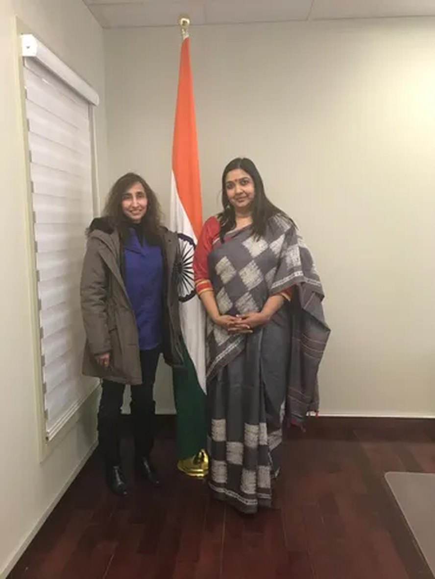 Naila with a community delegation