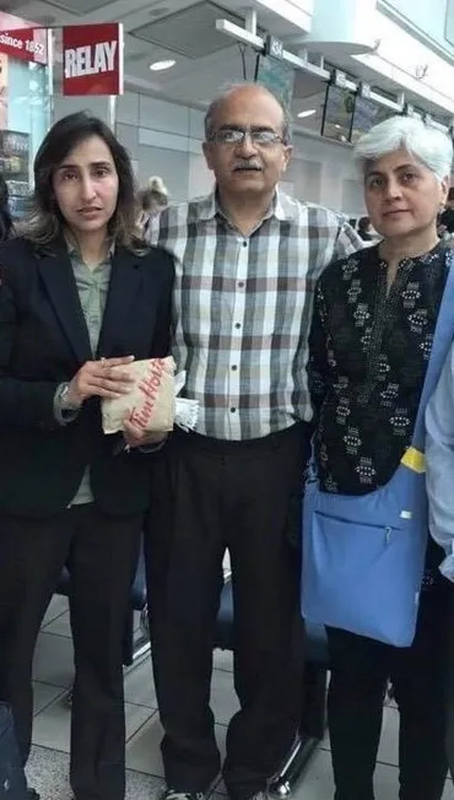 Naila Saeed with community members